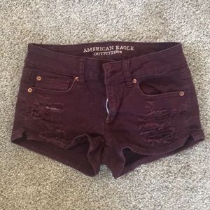 SOLD: American Eagle stretch denim shorts in burgundy.